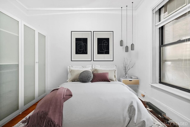 bedroom featuring hardwood / wood-style floors