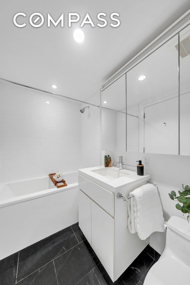425 W 53rd St Unit 419, New York City, NY 10019 - full bath with vanity, shower / bathtub combination, toilet, recessed lighting, and marble finish floors