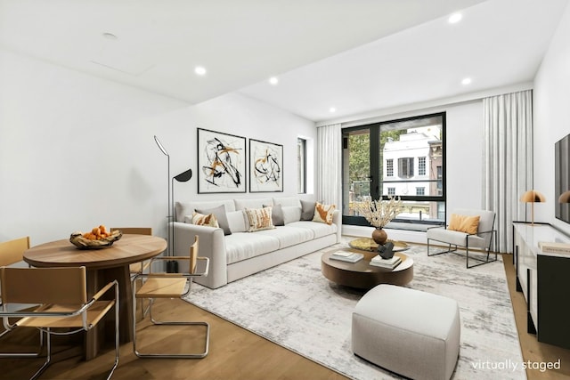 living room with hardwood / wood-style floors