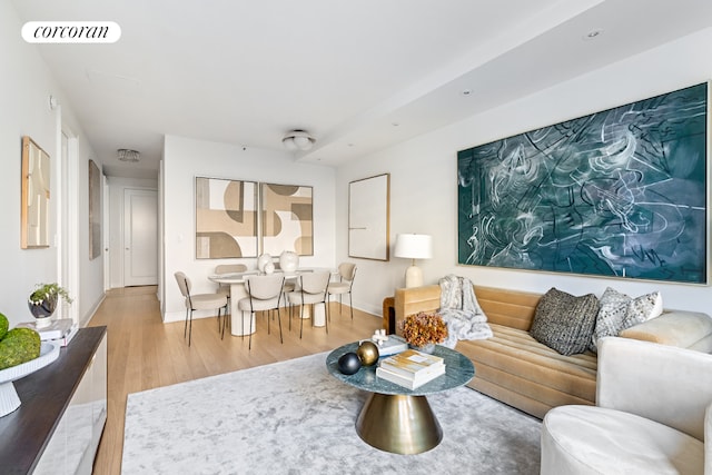 living room with light hardwood / wood-style floors