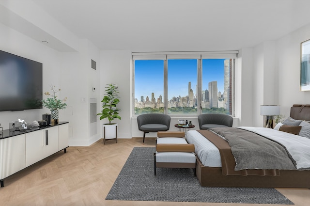 15 W 63rd St Unit 17-A, New York City, NY 10023 - bedroom with a skyline view and baseboards