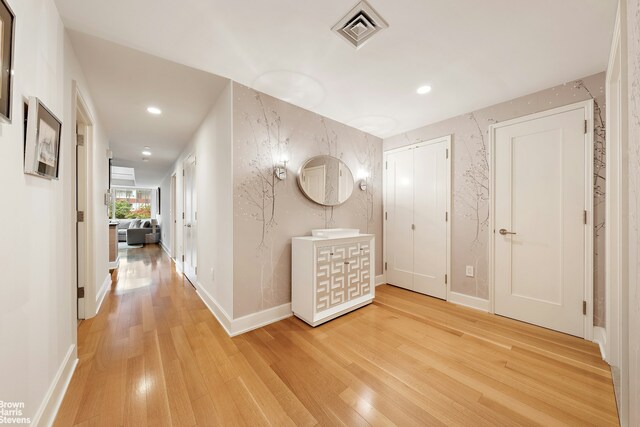 hall featuring light hardwood / wood-style floors