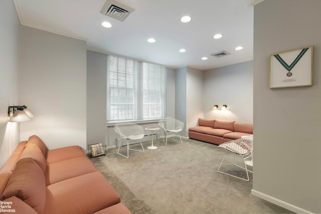 corridor featuring crown molding and light colored carpet