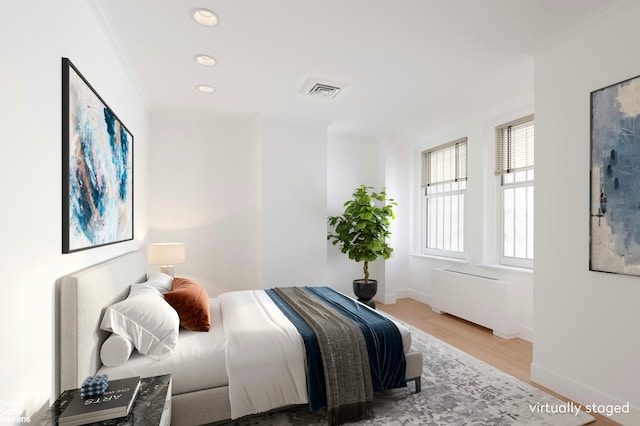 888 Park Avenue Maisonette, New York City, NY 10075 - bedroom featuring visible vents, wood finished floors, baseboards, ornamental molding, and recessed lighting