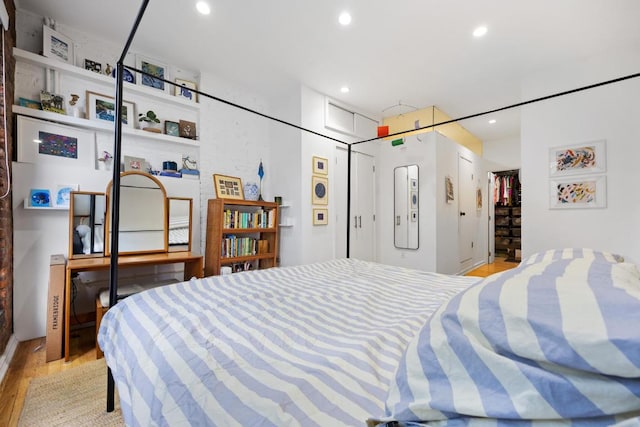 bedroom featuring light hardwood / wood-style floors