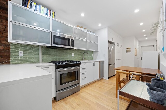 living room with brick wall and radiator heating unit