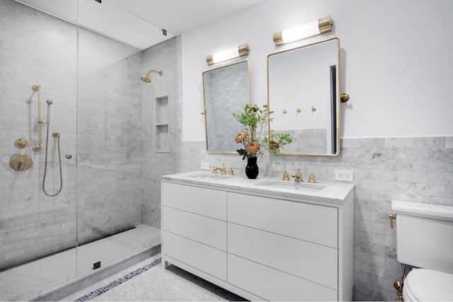 bathroom featuring a tile shower, tile walls, and toilet