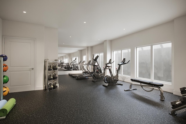 exercise room with recessed lighting