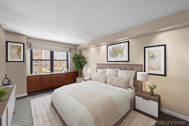 bedroom with baseboards and carpet flooring