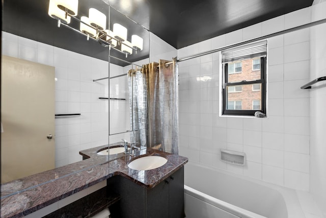 full bathroom featuring vanity and shower / tub combo