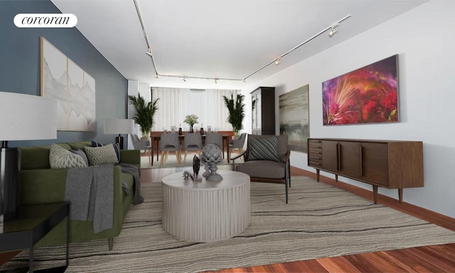 living room featuring hardwood / wood-style flooring and track lighting