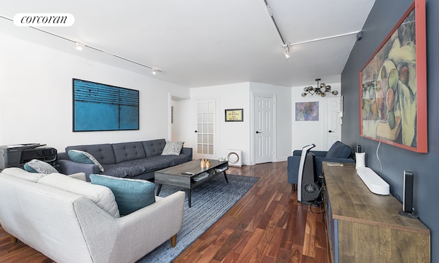 living room featuring dark wood-type flooring