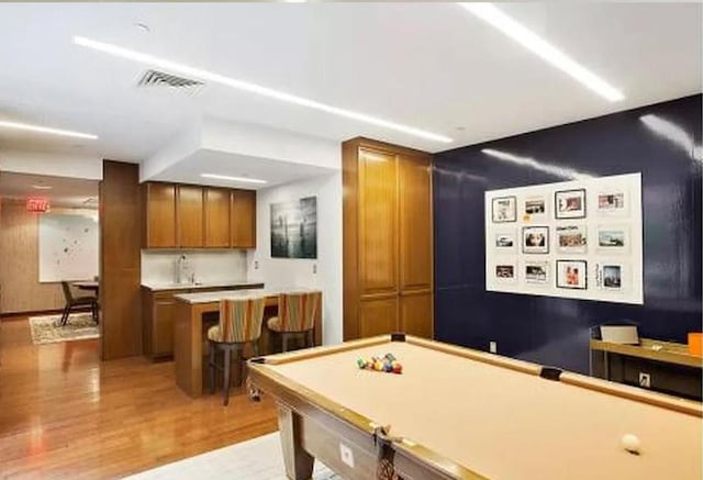 recreation room featuring light wood-type flooring and pool table