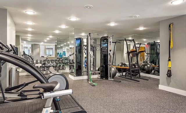 exercise room with baseboards