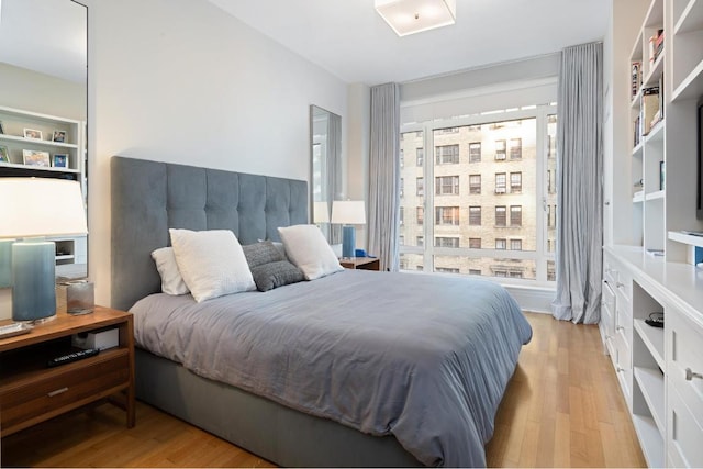 bedroom featuring light hardwood / wood-style floors