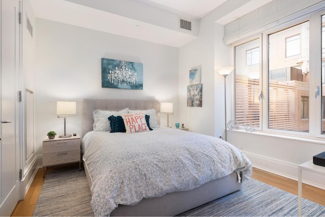 bedroom featuring hardwood / wood-style floors