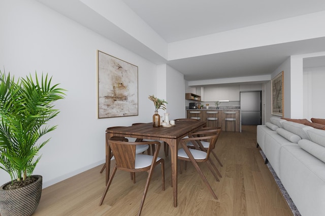 170 E End Ave Unit 2G, New York City, NY 10128 - dining space with baseboards and light wood finished floors