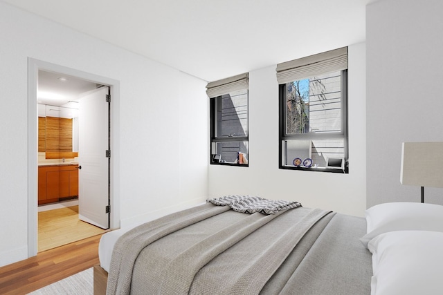 170 E End Ave Unit 2G, New York City, NY 10128 - bedroom with light wood-type flooring