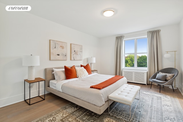 bedroom featuring wood-type flooring