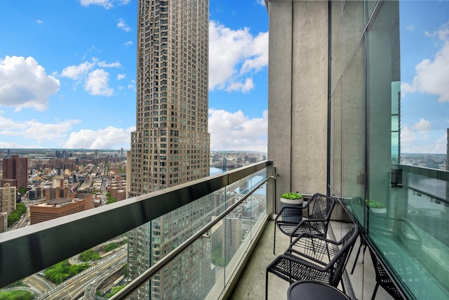 balcony featuring a view of city