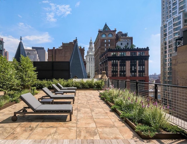 view of patio / terrace featuring a city view