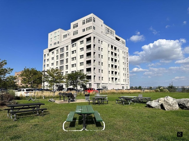 view of property with a yard