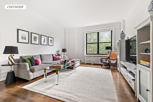 living area with visible vents and dark wood-style flooring