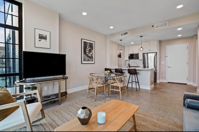 living room with sink