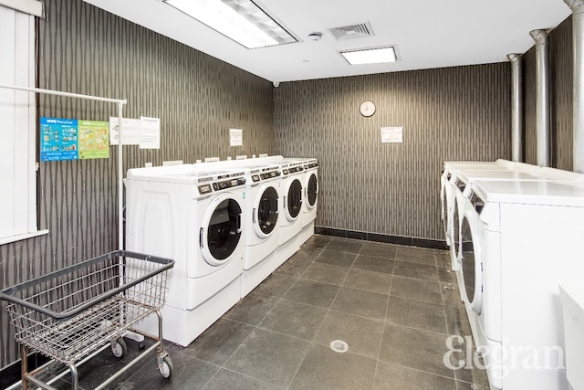 laundry room featuring separate washer and dryer