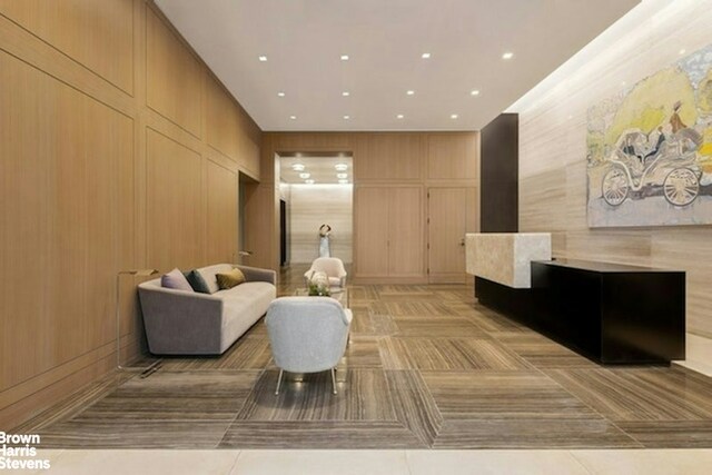 game room with pool table, dark hardwood / wood-style floors, and a tray ceiling