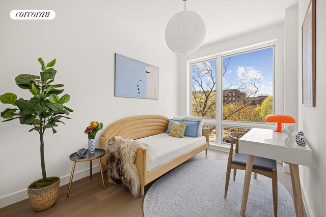 379 Ocean Pkwy Unit 8B, New York City, NY 11218 - bedroom featuring wood finished floors and baseboards