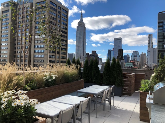 view of patio with an outdoor bar