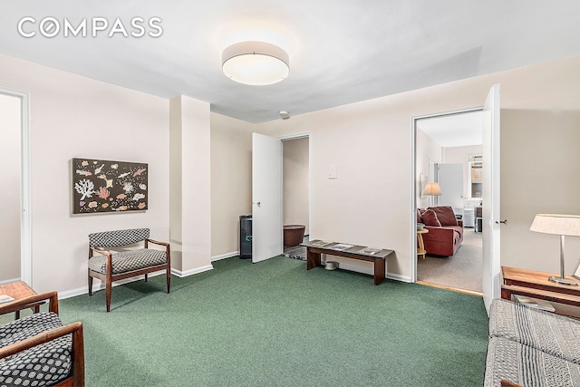 65 E 76th St Unit 1C, New York City, NY 10021 - sitting room featuring carpet and baseboards