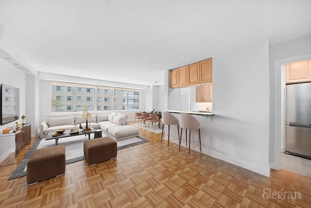 living room featuring light parquet flooring