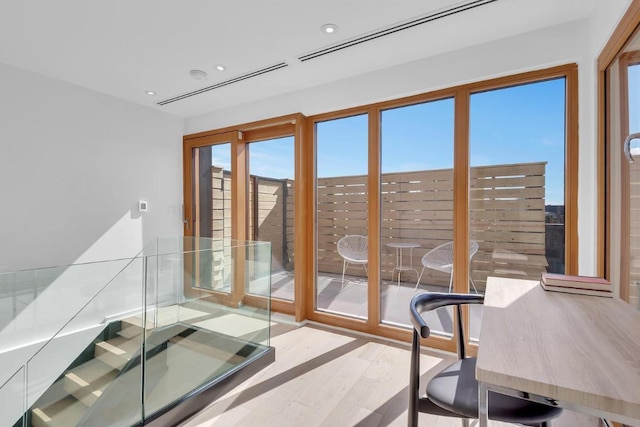 doorway to outside featuring hardwood / wood-style floors