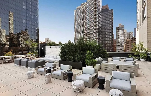 view of patio with a city view and an outdoor hangout area