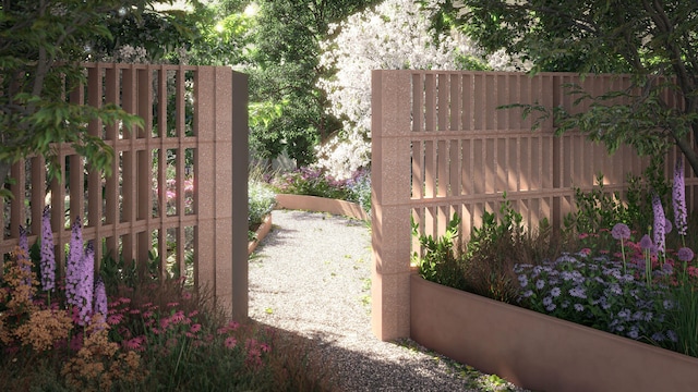 view of gate with fence