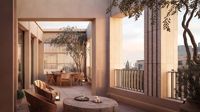 balcony with a patio and outdoor dining space