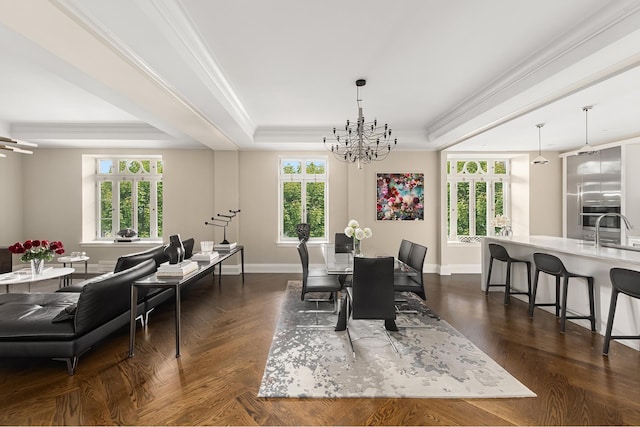 dining space with plenty of natural light, crown molding, a raised ceiling, and a notable chandelier