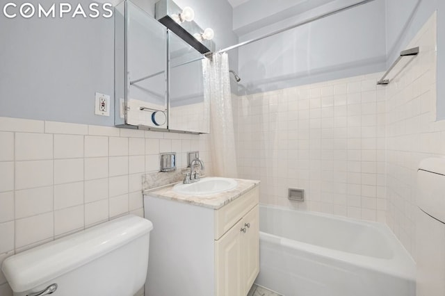 full bathroom with toilet, tile walls, vanity, shower / bath combination with curtain, and decorative backsplash