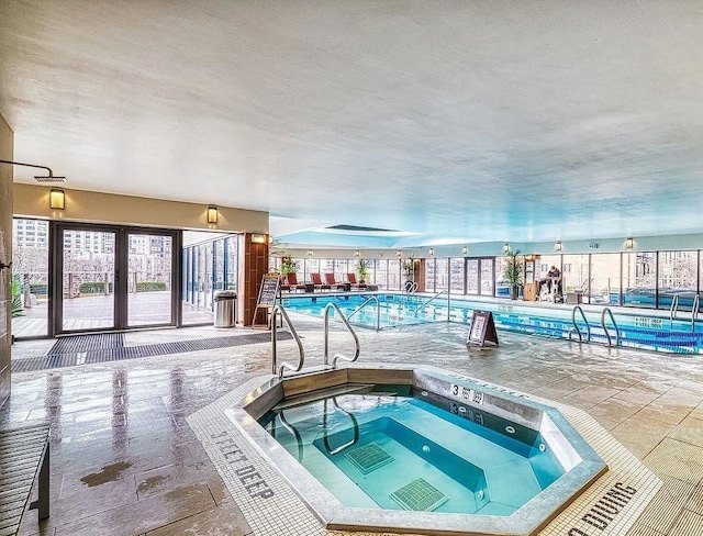 pool with an indoor hot tub