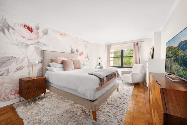 bedroom with crown molding and parquet flooring