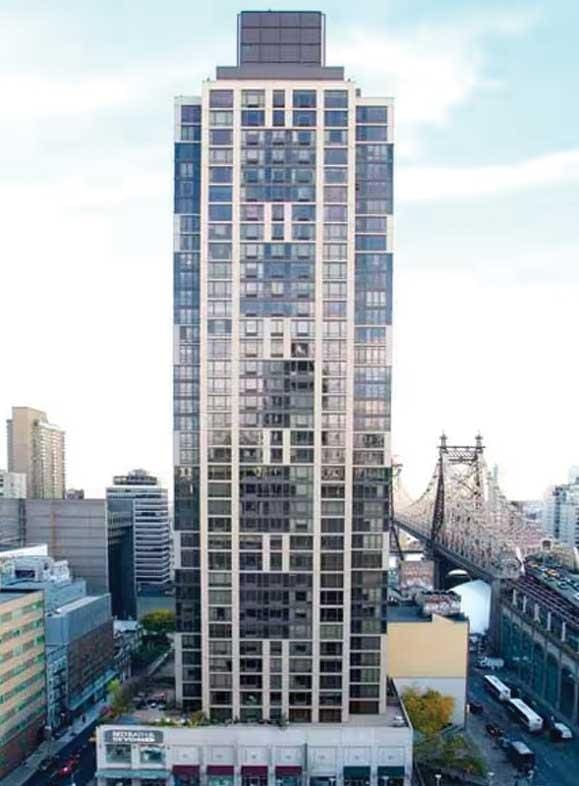 view of building exterior featuring a city view