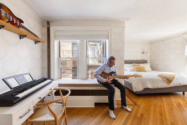 104-106 Bedford St Unit 6Ab5A, New York City, NY 10014 - bedroom with wallpapered walls and light wood-type flooring