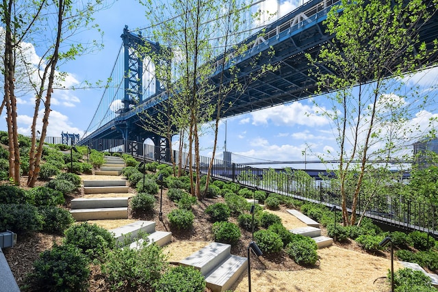 252 S St Unit 76E, New York City, NY 10002 - surrounding community with stairway and fence