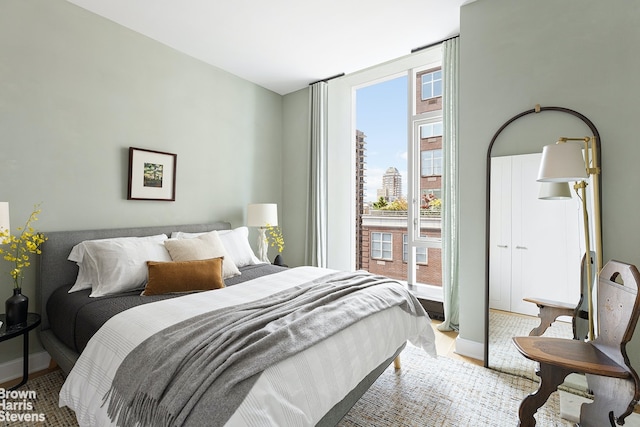 bedroom featuring multiple windows