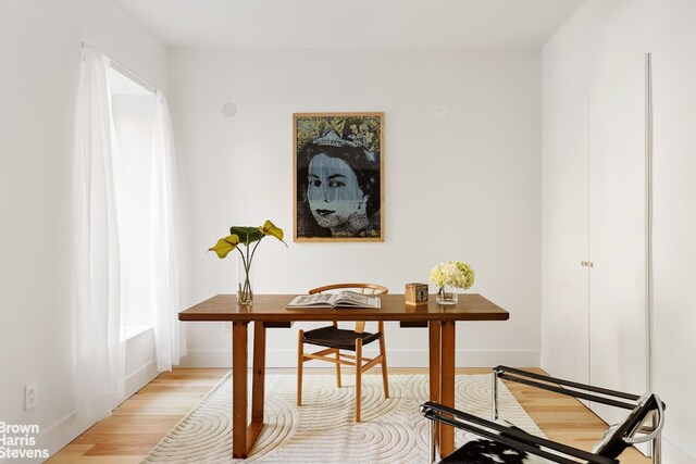 office area with light hardwood / wood-style flooring