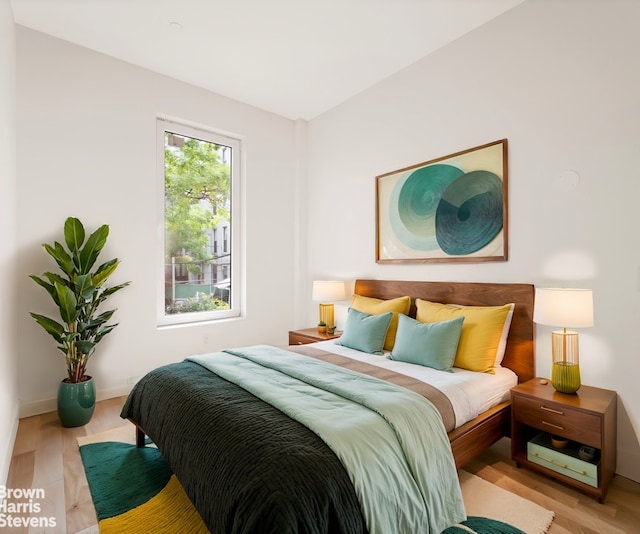 bedroom with light hardwood / wood-style floors