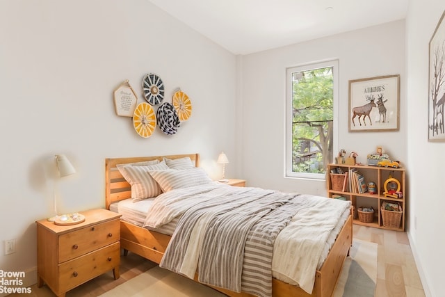 bedroom featuring light wood-type flooring