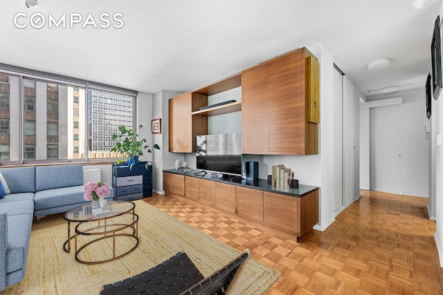 kitchen featuring light parquet flooring